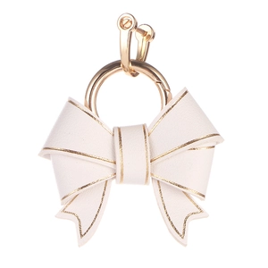 Elegant white faux leather bow earrings with gold trim on a clean white background