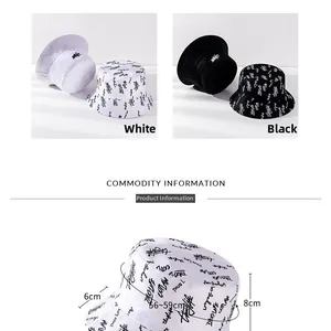 Detailed view of reversible cotton bucket hat showing size dimensions and graffiti pattern