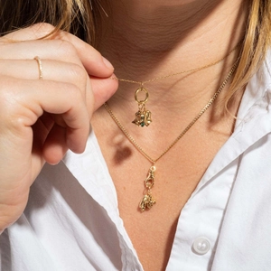 Layered 18K gold plated flower necklace with green birthstone and palm pendant set