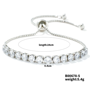 Detailed view of silver tennis bracelet with cubic zirconia and adjustable slide clasp