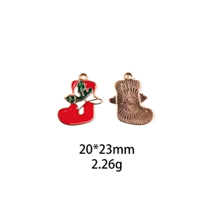 Front and back detail of Christmas stocking alloy pendant with size and weight specs