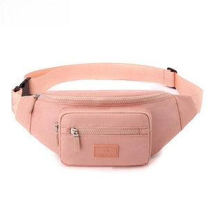 Detailed view of large capacity pink nylon chest bag with adjustable strap and zip pocket