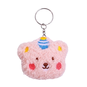 Close-up of pink plush panda keychain with blue embroidery and durable metal clip