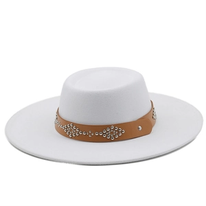 Detail view of white wool fedora with brown studded leather band and silver rivet pattern
