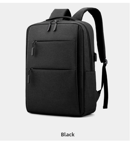 Detailed view of black travel backpack with side USB charging port and durable fabric