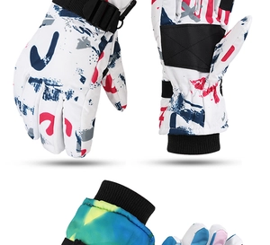 Waterproof ski mittens in white and gradient colors with adjustable wrist straps and clips