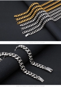 Detail of silver and gold Cuban link chains showing polished finish and secure clasp