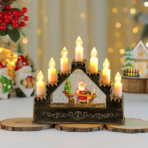 Macro shot of a 7-LED candle bridge with festive Santa snow globe and ornate bronze base