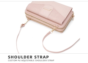 Detail of pink PU leather phone bag featuring dual zippers and adjustable shoulder strap