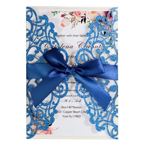 Laser cut dark blue wedding invitation card with elegant floral inner and silk ribbon