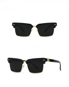 Front and 45-degree side views of black square sunglasses with gold metal accents
