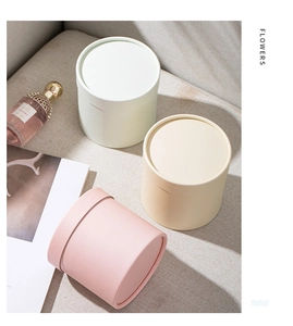 Three-color round mini gift flower boxes in pink, beige and light green matte paper