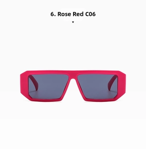 Close-up of rose red rectangle frame sunglasses with deep gray lenses and C06 detail