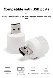 Detail view of portable USB LED night light showing USB-A connector and compact design