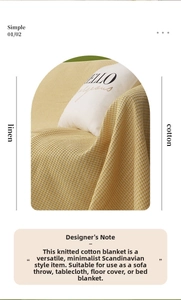 Close-up of ginger waffle knit cotton linen sofa cover with detailed fabric texture