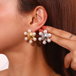 Chic 18K gold plated stainless steel swirl earrings with pearls and metal starburst design