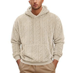 Detailed close-up of men's beige teddy fleece hoodie showing thick cable knit texture