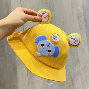 Detail of yellow cotton baby sun hat with cute cartoon elephant embroidery and ear accents