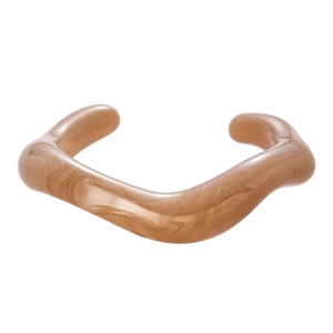 Elegant wavy acrylic open bangle featuring amber marble patterns on a white background