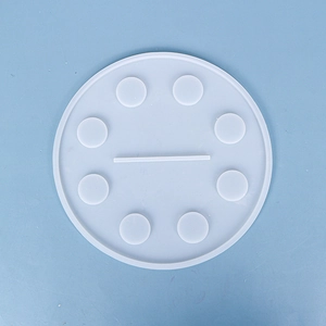 Macro view of round silicone mold with rectangular and circular slots for resin craft