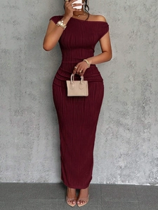 Detail of burgundy ruched fabric and one-shoulder neckline on a slim fit maxi dress