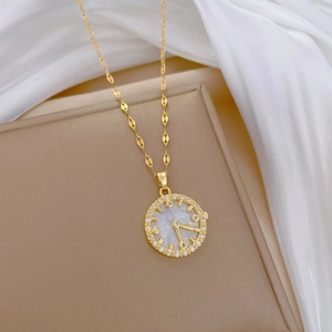 Luxurious gold stainless steel shell clock necklace with sparkling crystals on white silk