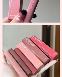 Detailed display of multiple matte velvet lipsticks and packaging in varied shades