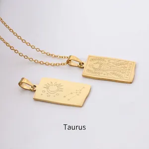 Detailed view of rectangular gold Taurus zodiac pendant necklace in polished steel