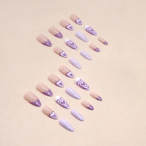 Purple almond press-on nails set with heart patterns and glittery star French tips