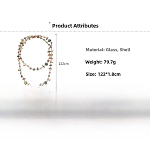 Detail of 122cm long mixed glass beads and natural shell fragments necklace