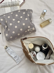 Vintage corduroy polka dot makeup bag with zipper closure and soft inner lining