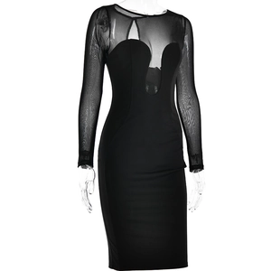 Detail of black bodycon dress featuring sheer mesh sleeves and a cutout neckline design