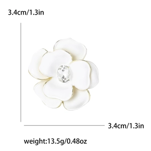 Detailed size and weight specs of white enamel camellia brooch with rhinestone center