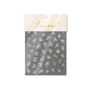Iridescent seashell nail art stickers with snowflake and bubble patterns on white background