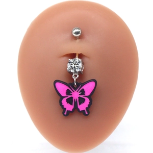 Macro view of butterfly navel piercing with pink drip oil wings and white zircon on a model