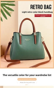 Retro forest green tote bag with brown handles and Fashion Queen gold logo detail