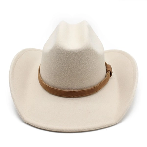 Detail view of cream felt cowboy hat with a brown leather strap and buckle