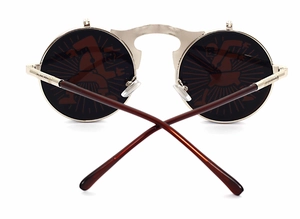 Detailed view of steampunk round flip-up sunglasses with silver frame and Vault Boy lenses