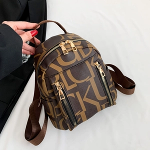 Brown PU leather backpack with vintage letter print and gold zipper on white background