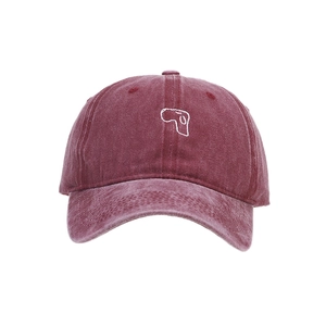 Vintage washed burgundy baseball cap featuring a minimalist white puppy embroidery