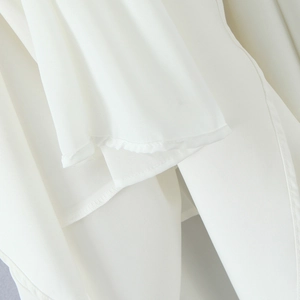 Elegant white halter neck long dress with side slit and backless design in soft chiffon