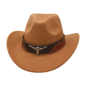 Detail of camel wool cowboy hat featuring a leather band with silver bull head emblem