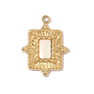 Detailed view of a gold rectangular sunburst pendant with a white shell inlay