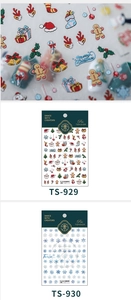 Detailed close-up of ultra-thin Christmas snowflake and gingerbread man nail stickers