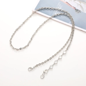 Silver metal crossbody phone chain with five transparent heart crystal charms and lobster clasps