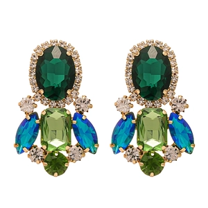 Elegant gold oval earrings with emerald and sapphire rhinestones and metal tassels