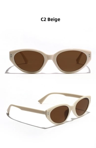 Detailed views of beige cat-eye sunglasses with brown lenses and metal rivets