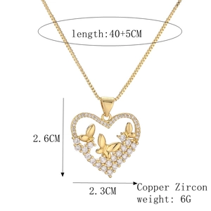 Detail of heart butterfly pendant with size dimensions and copper zircon material info