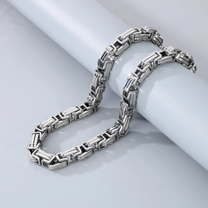 Detail shot of silver Byzantine chain for men with high-quality polished stainless steel links