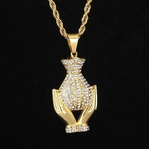 Detailed view of hip-hop money bag pendant with diamonds and dollar symbol on gold chain